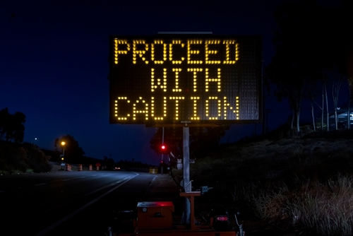 Proceed with caution sign