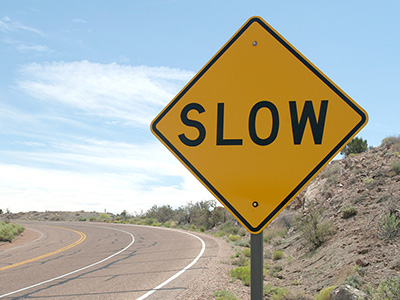 Slow road sign